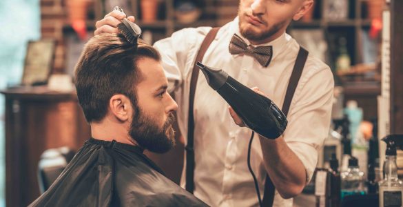 new-hairstyle-side-view-young-bearded-man-getting-groomed-hairdresser-with-hair-dryer new-hairstyle-side-view-young-bearded-man-getting-groomed-hairdresser-with-hair-dryer